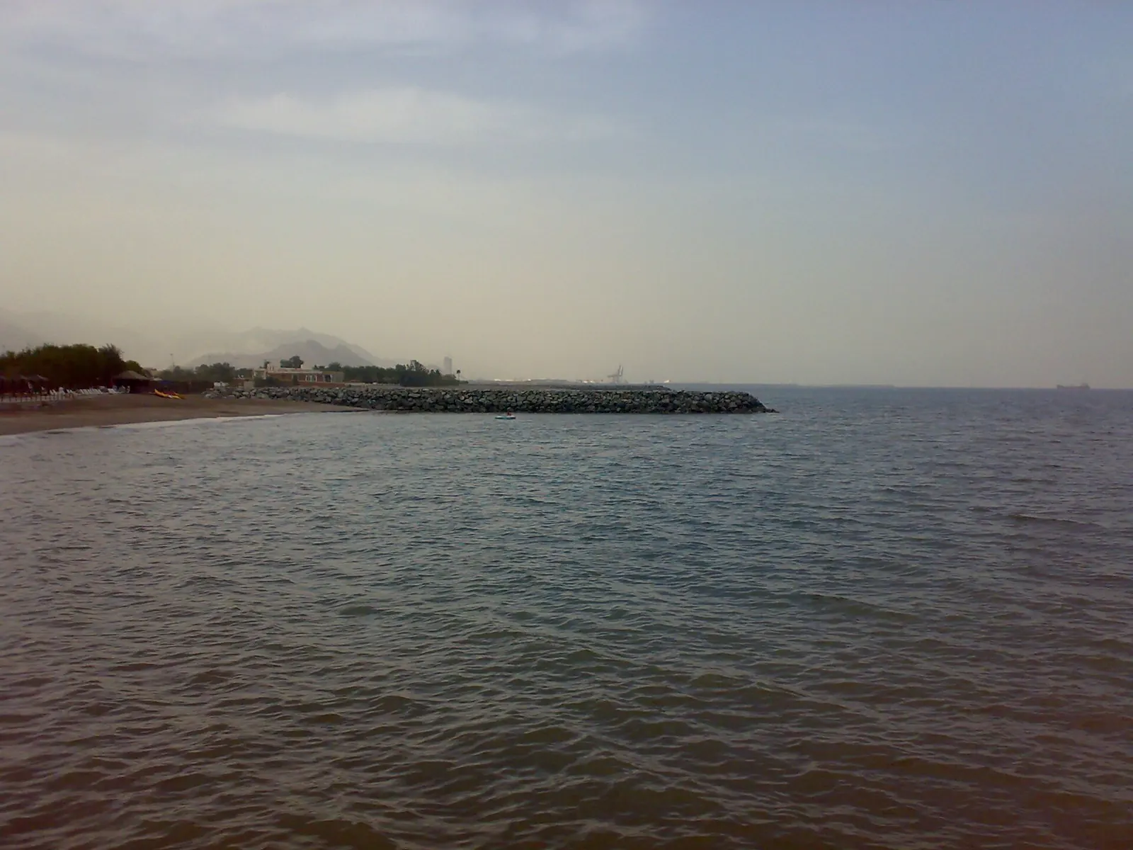 Fujairah port with the oil transit terminal in the distance, United Arab Emirates