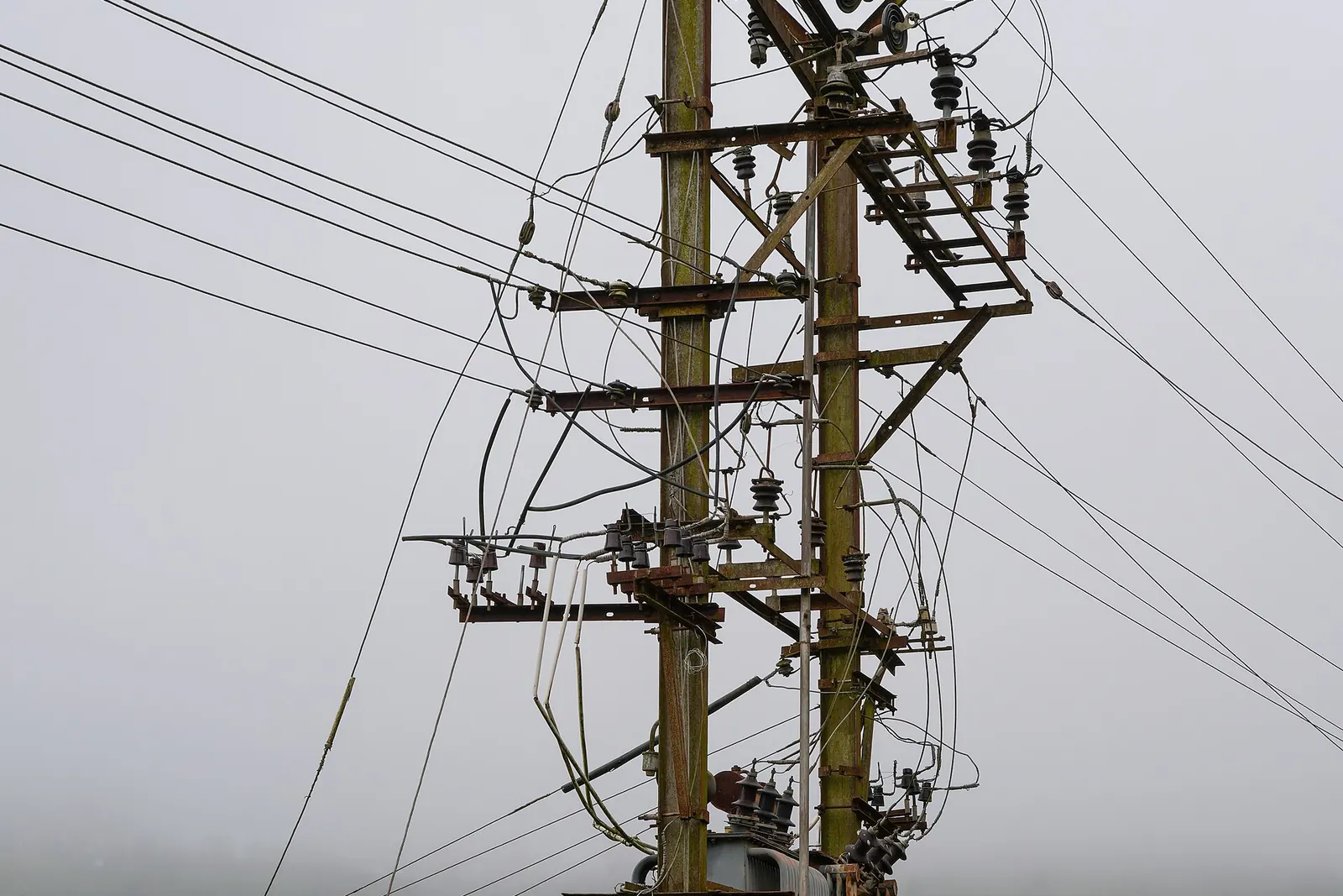 A distribution transformer on a utility pole in Tamil Nadu, India